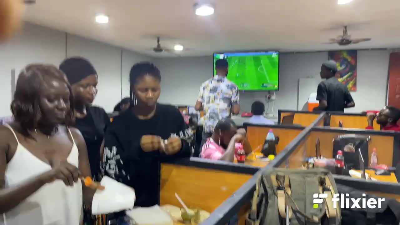 A team celebration featured in Godfred’s workplace rewards project write-up